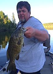 Trophy Smallmouth Bass Fishing at Fireside Lodge by Stacey